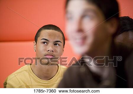 Close-up of teenage boy with friends View Large Photo Image Stock Image - Close-up of teenage boy with friends. Fotosearch