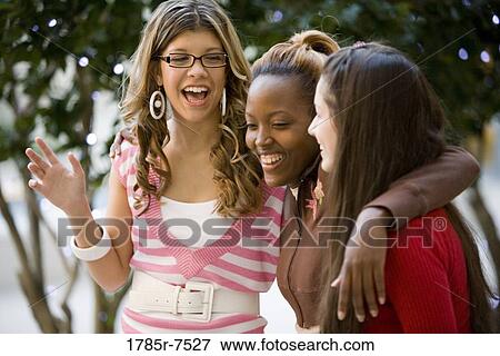 Close-up of three women friends smiling View Large Photo Image Stock Photo - Close-up of three women friends smiling. Fotosearch