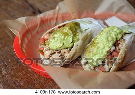 Close-up of two chicken tacos View Large Photo Image Stock Photo - Close-up of two chicken tacos. Fotosearch