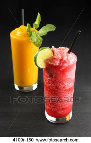 Stock Image - Close-up of two smoothies. Fotosearch
