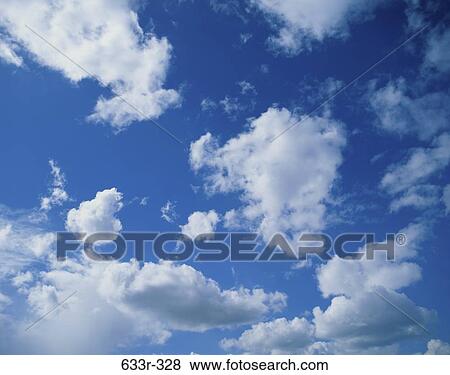 Stock Photo - Clouds in a blue sky. Fotosearch