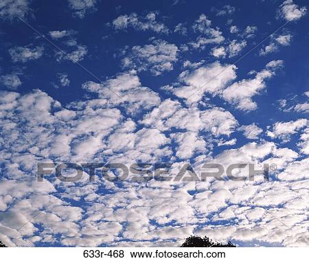 Clouds in the sky View Large Photo Image Stock Photo - Clouds in the sky. Fotosearch