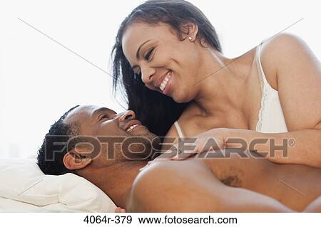 Couple sharing an intimate moment View Large Photo Image Stock Photo - Couple sharing an intimate moment. Fotosearch