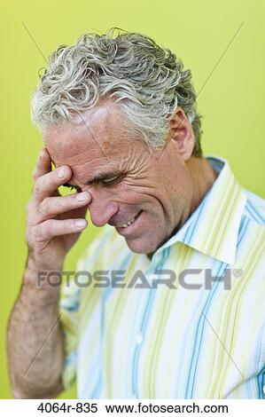 Embarrassed mature businessman View Large Photo Image Stock Photography - Embarrassed mature businessman. Fotosearch