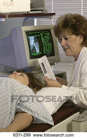 Female doctor with a female patient View Large Photo Image Stock Photo - Female doctor with a female patient. Fotosearch