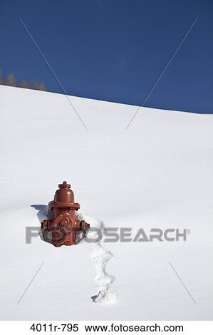 Stock Photography - Fire hydrant buried in snow. Fotosearch