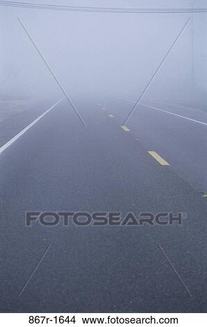 Fog over a road View Large Photo Image Picture - Fog over a road. Fotosearch