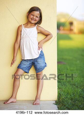 Girl posing and smiling, portrait View Large Photo Image Stock Image - Girl posing and smiling, portrait. Fotosearch