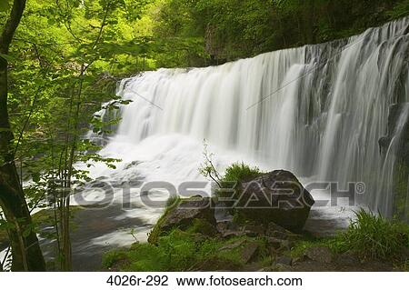 Stock Image - Great Britain, Wales, Powys, Ystradfellte, Brecon Beacons, Sgwd Isaf Clun Gwyn Waterfall and Afon Mellte. Fotosearch
