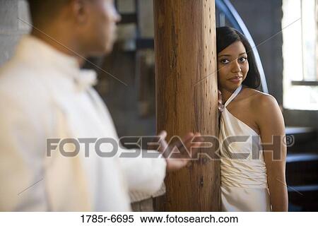 Groom beckoning bride View Large Photo Image Stock Photography - Groom beckoning bride. Fotosearch