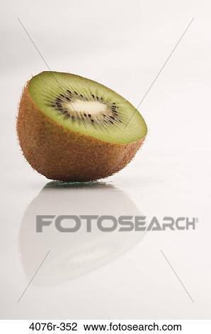 Half of kiwi fruit View Large Photo Image Stock Image - Half of kiwi fruit. Fotosearch