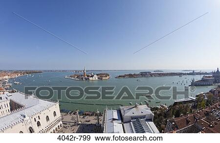 Stock Photo - High angle view of a cityscape from St Mark's Campanile, Doge's Palace, Venice, Veneto, Italy. Fotosearch