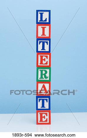 Picture - horizontal view of child building blocks spelling the word literate, set against a blue background. Fotosearch