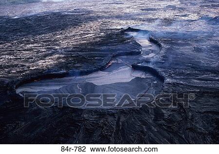 Stock Image - Lava at a volcano, Hawaii, USA. Fotosearch