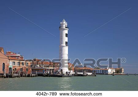 Lighthouse at the waterfront, Murano, Venice, Veneto, Italy View Large Photo Image Stock Photo - Lighthouse at the waterfront, Murano, Venice, Veneto, Italy. Fotosearch