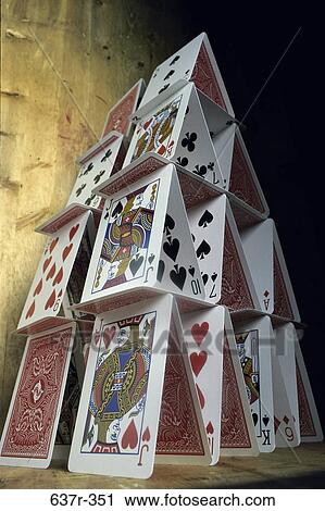 Low angle view of a house of cards View Large Photo Image Stock Image - Low angle view of a house of cards. Fotosearch