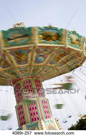 Low angle view of an amusement park ride, Jardin de Tuileries, Paris, Ile-De-France, France View Large Photo Image Stock Photo - Low angle view of an amusement park ride, Jardin de Tuileries, Paris, Ile-De-France, France. Fotosearch