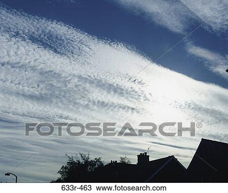 Stock Image - Low angle view of clouds in the sky. Fotosearch