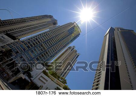 Low angle view of skyscrapers in a city View Large Photo Image Stock Photograph - Low angle view of skyscrapers in a city. Fotosearch