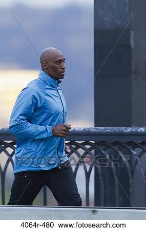 Man jogging View Large Photo Image Stock Image - Man jogging. Fotosearch