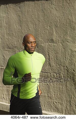 Man jogging View Large Photo Image Stock Photo - Man jogging. Fotosearch