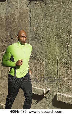 Man jogging View Large Photo Image Stock Photograph - Man jogging. Fotosearch