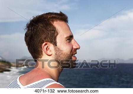 Man overlooking beach in Rio de Janeiro, Brazil View Large Photo Image Stock Image - Man overlooking beach in Rio de Janeiro, Brazil. Fotosearch