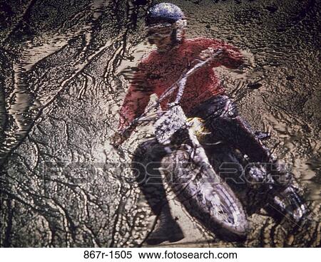 Man riding a motorcycle View Large Photo Image Stock Photography - Man riding a motorcycle. Fotosearch