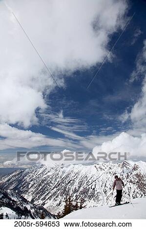 Man skiing in snow, Wasatch Mountains, Uinta-Wasatch-Cache National Forest, Salt Lake City, Utah, USA View Large Photo Image Stock Image - Man skiing in snow, Wasatch Mountains, Uinta-Wasatch-Cache National Forest, Salt Lake City, Utah, USA. Fotosearch