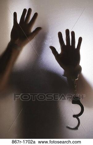 Man trapped behind frosted glass wearing handcuffs View Large Photo Image Stock Image - Man trapped behind frosted glass wearing handcuffs. Fotosearch