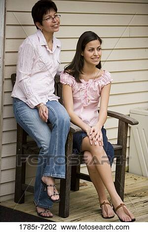 Stock Image - Mexican-American mother and daughter. Fotosearch