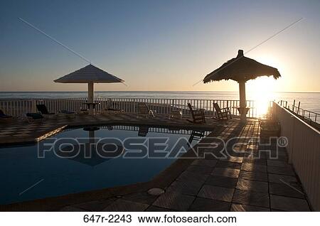 Mexico, Baja California Sur, Los Barriles, swimming pool and sea at sunset View Large Photo Image Stock Image - Mexico, Baja California Sur, Los Barriles, swimming pool and sea at sunset. Fotosearch