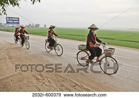 Stock Photo - Minority women with beehive hair style; possibly Black Thai or Black H'Mong., Dien Bien Phu Vietnam. Fotosearch
