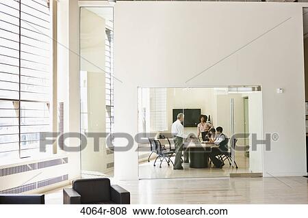 Stock Photo - Office meeting. Fotosearch