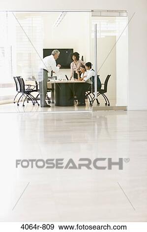 Stock Photo - Office meeting. Fotosearch
