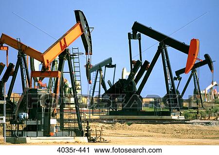 Oil rig drilling for an oil well View Large Photo Image Stock Image - Oil rig drilling for an oil well. Fotosearch