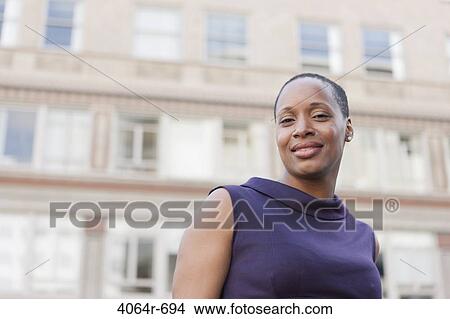 Outdoor portrait of smiling businesswoman View Large Photo Image Picture - Outdoor portrait of smiling businesswoman. Fotosearch