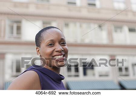 Outdoor portrait of smiling businesswoman View Large Photo Image Stock Image - Outdoor portrait of smiling businesswoman. Fotosearch
