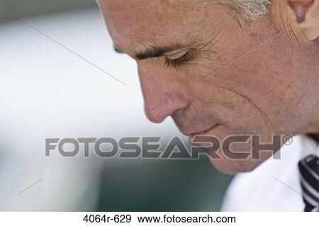 Pensive businessman outdoors View Large Photo Image Stock Photo - Pensive businessman outdoors. Fotosearch