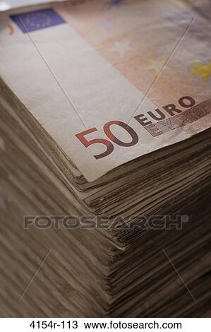 Stock Image - Pile of Fifty Euro banknotes. Fotosearch