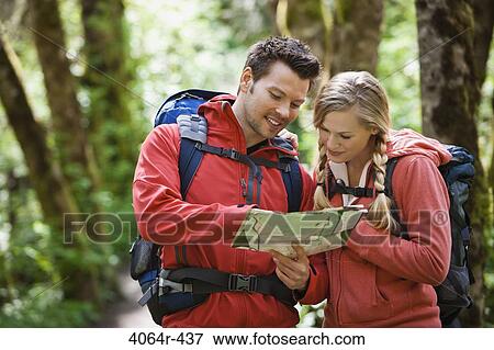 Portland, Oregon, USA, Couple hiking, stopping to look at map View Large Photo Image Stock Photo - Portland, Oregon, USA, Couple hiking, stopping to look at map. Fotosearch