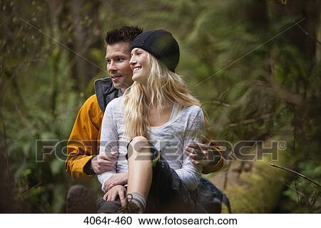 Portland, Oregon, USA, Couple taking lunch break on log View Large Photo Image Stock Image - Portland, Oregon, USA, Couple taking lunch break on log. Fotosearch