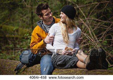 Portland, Oregon, USA, Couple taking lunch break on log View Large Photo Image Stock Photo - Portland, Oregon, USA, Couple taking lunch break on log. Fotosearch
