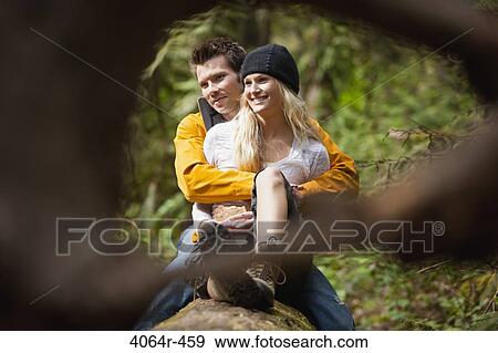 Portland, Oregon, USA, Couple taking lunch break on log View Large Photo Image Stock Photo - Portland, Oregon, USA, Couple taking lunch break on log. Fotosearch