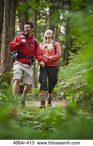 Portland, Oregon, USA, Couple walking on trail through forest View Large Photo Image Stock Image - Portland, Oregon, USA, Couple walking on trail through forest. Fotosearch