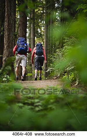 Portland, Oregon, USA, Couple walking on trail through forest View Large Photo Image Stock Photo - Portland, Oregon, USA, Couple walking on trail through forest. Fotosearch