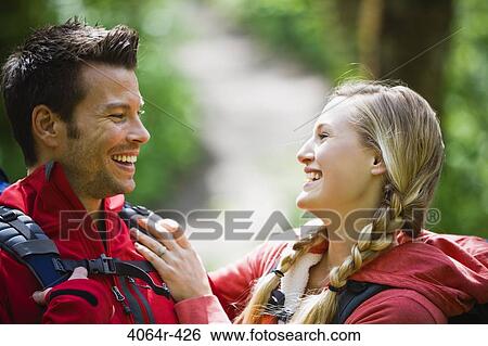 Stock Photograph - Portland, Oregon, USA, Man and woman hiking, portrait. Fotosearch