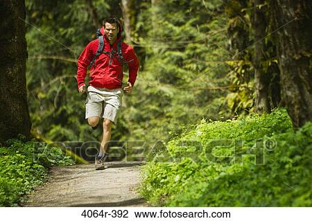 Portland, Oregon, USA, Man trail running with backpack View Large Photo Image Stock Image - Portland, Oregon, USA, Man trail running with backpack. Fotosearch