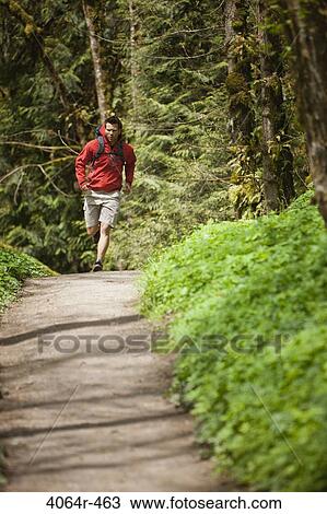 Portland, Oregon, USA, Man trail running with backpack View Large Photo Image Stock Image - Portland, Oregon, USA, Man trail running with backpack. Fotosearch