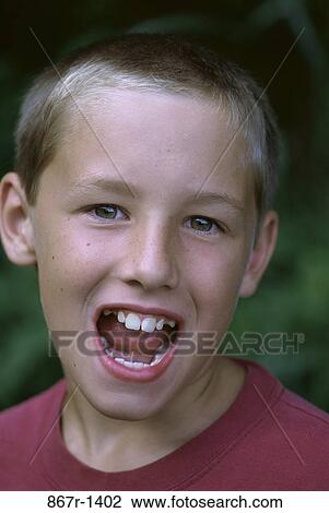 Portrait of a boy yelling View Large Photo Image Stock Image - Portrait of a boy yelling. Fotosearch